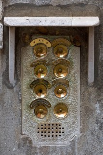 Brass bells on a residential building, Venice, Veneto, Italy