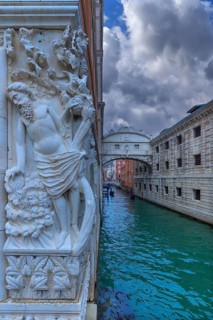 Relief of the drunken Noah at the Doge's Palace, in the back the Bridge of Sighs, Venice, Veneto,