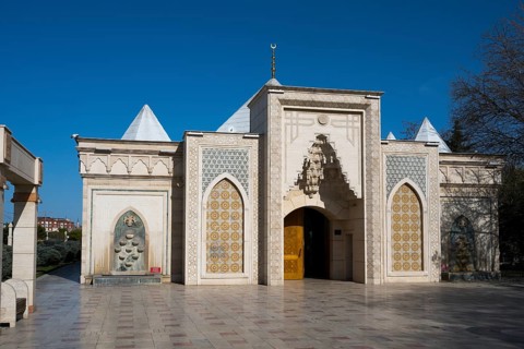 Traditional building with Islamic architectural elements and blue decorations, Istiklal Harbi