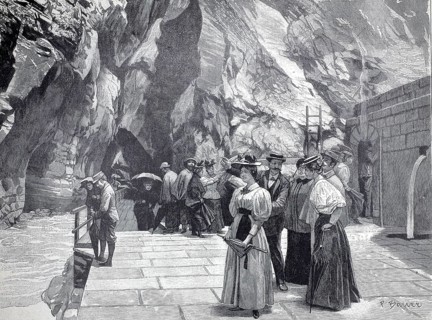 Day trippers at the end of the Tamina Gorge in front of the entrance to the spring, part of the