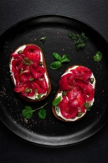 Sandwiches with gravlax salmon, cream cheese, capers, greens, breakfast, homemade