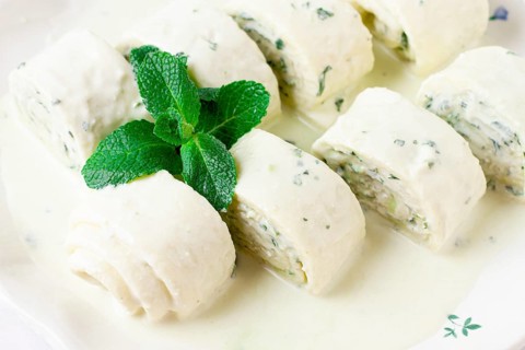 Gebjalia, a traditional Megrelian dish, cold appetizer of cheese with mint, Georgian cuisine, on a