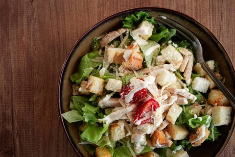 Classic Caesar salad, close-up, natural light, selective focus, horizontal