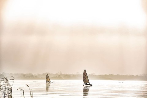 Ice sailor on the frozen Dümmer Lake in a sepia mood, Lembruch, Lower Saxony, Germany