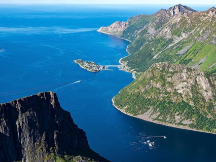 Island Husoy, fjord Ornfjorden, Senja island, Norway