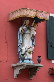 Saint figure under a canopy, Venice, Veneto, Italy