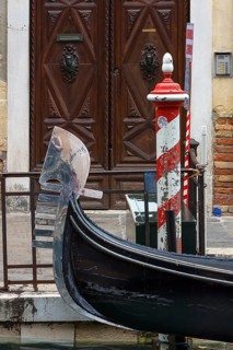 Mellschweif on a gondola, the six spikes symbolize the six districts of Venice, Veneto, Italy