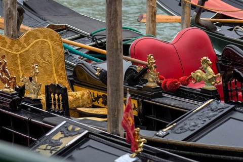 Mythological brass horse figures decorate decorative gondolas, Venice, Veneto, Italy