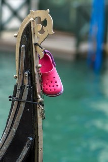 Children's shoe from the child of a gondolier on a gondola, Venice, Veneto, Italy
