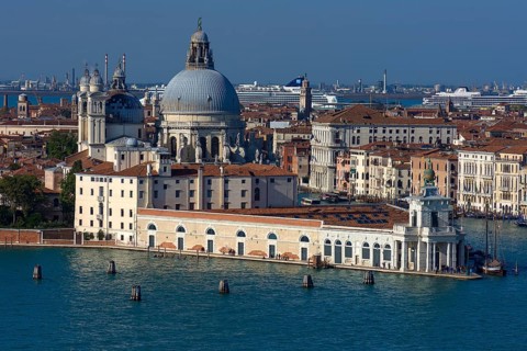 Santa Maria della Salute church, Museum of Modern Art in front, cruise ships anchored at the back,