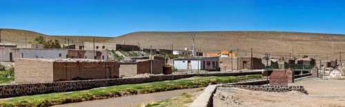 Overview of a small village in a dry and sunny hilly area, San Antonio de los Cobres, Salta