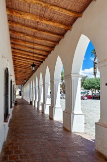 Colonial arcade series with wooden roof, opens to a public square, The arcades of Cachi in