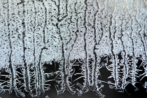 Frost formation on a living room window, Region of la Mauricie, Province of Quebec, Canada