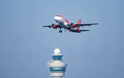 Easyjet Airbus A319 aircraft takes off from Kaagbaan runway, 06/24, at Amsterdam Schiphol Airport,