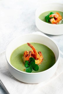 Pea cream soup, with shrimp, green soup, homemade, top view, no people