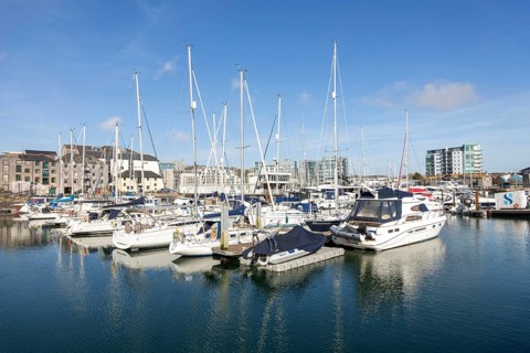 Boats at moorings in marina Sutton Harbour, Barbican. Plymouth, Devon, UK