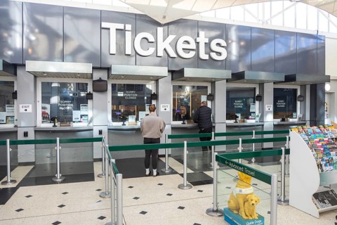 Ticket office counters Tickets area, concourse of railway station at Plymouth, Devon, England, UK