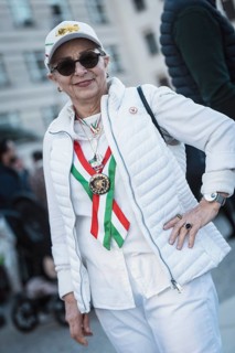A participant in the colors of Iran at the demonstration by exiled Iranians under the motto Freedom