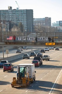 Detroit, Michigan USA - 2 March 2026 - Signs are posted on a pedestrian crosswalk over a freeway