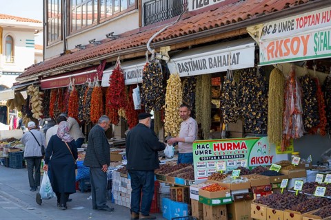 Bustling market with hanging spices and people shopping, Konya, Central Anatolia, Turkey