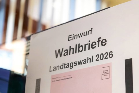 Absentee voting symbol: Sign on a municipal administration for dropping in ballot letters