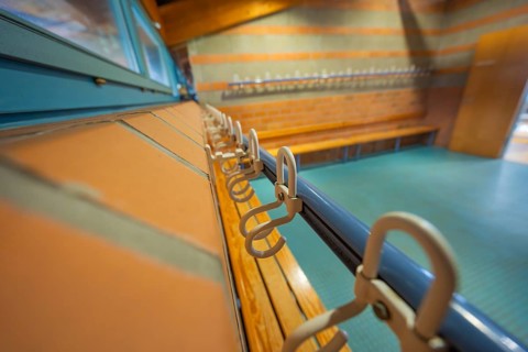 Close-up view of hooks and blue tiles in a functional room, Schlehengäu Grund Schule Gechingen,