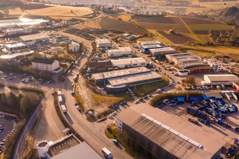 Aerial view of an industrial area with roads and fields, insights into urban planning, Calw, Calw