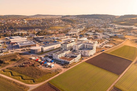 Large urban and industrial area in the middle of a hilly region, new hospital at the Calw health
