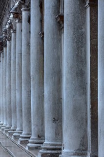Historic Columns with Sculptures, Arcade of the Procuraties, Venice, Veneto, Italy
