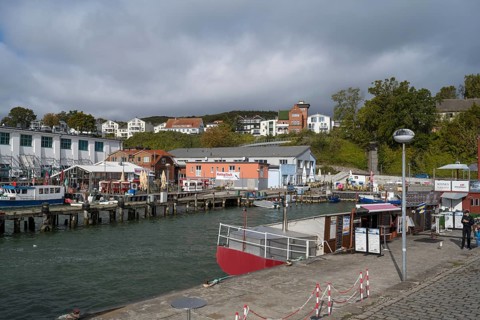 Fishing boats and fish shops at the city harbor, Sassnitz, Rügen, island, Baltic Sea,