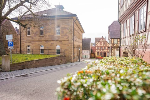 Street scene in a historic district with old buildings and intersecting roads, Ötisheim, Enzkreis,