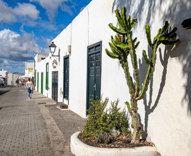 Typical white houses with colored doors and windows, Teguise, Lanzarote, Canary Islands, Spain