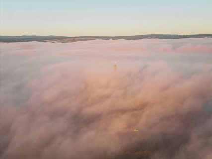 Sunrise over a sea of clouds creating a soft and peaceful atmosphere, Gechingen, Calw district,