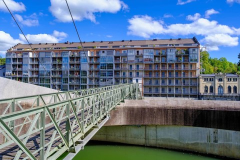 Old renovated spinning mill and dam, hydroelectric power plant on the Iller, Kempten, Oberallgäu,
