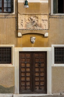 Relief illustration from Greek mythology, Vulcan hardens Cupid's arrows, Venice, Veneto, Italy