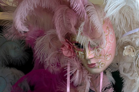 Carnival mask in a shop window, Venice, Veneto, Italy