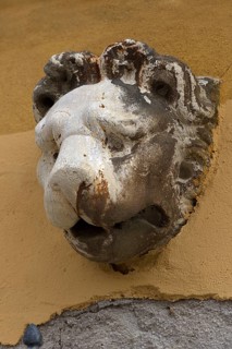 Sculpture of a lion's head above an entrance, Venice, Veneto, Italy