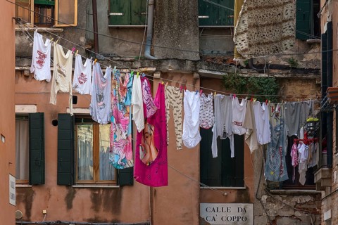 Laundry hung up for tourists in the Castello district, Venice, Veneto, Italy
