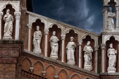 Sculptures of saints at Madonna dell'Oro parish church, Venice, Veneto, Italy