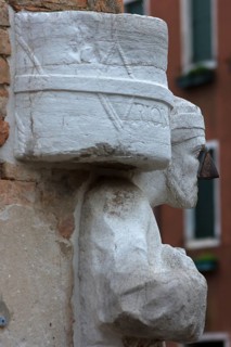 Detail of the marble statue of a merchant family from the 13th and 14th century, Campo dei Mori in