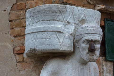 Detail of the marble statue of a merchant family from the 13th and 14th century, Campo dei Mori in