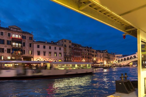 View of the Palazzi on the Grand Canal from a moving traghetto, Venice, Veneto, Italy
