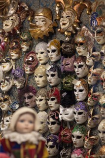 Wall with Venetian carnival masks in a shop, Venice, Veneto, Italy