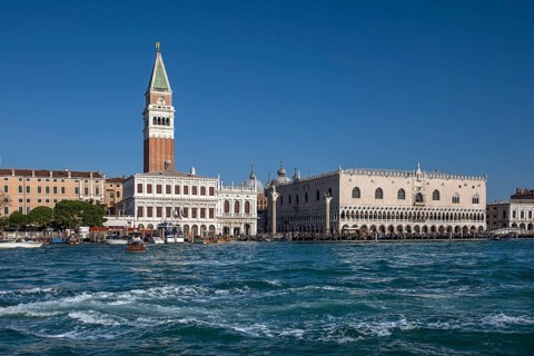 View of St. Mark's Campanile and Doge's Palace from the Grand Canal, blue sky, Venice, Veneto,