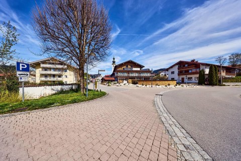 Alpine buildings, road, curve, church tower, parking lot, Alpenliebe Design Hotel, bare winter