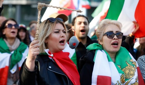 Iranians demonstrate on the day of the US and Israeli attack on Iran in Berlin, 28.02.2026. Many