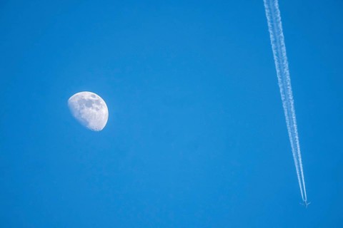 The moon, crescent, increasing, airplane, with contrails