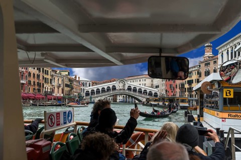 View from a traghetto of the Rialto Bridge, Grand Canal, Venice, Veneto, Italy