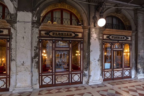 Historic Café Florian in the arcades of the old Procuration, 16th century early in the morning,