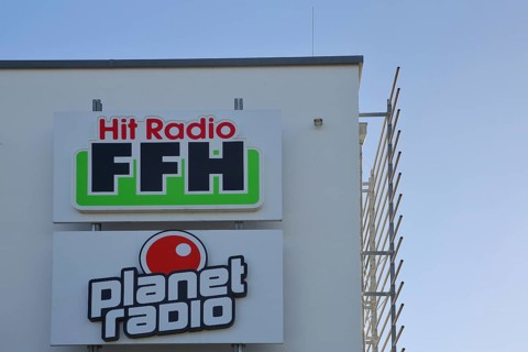 Hit Radio FFH building, inscription, radio station, emblem, planet, Bad Vilbel, Wetterau, Hesse,